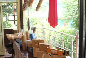 yoga-school Yoga books and props kept near window at Yoganandham yoga school.